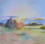 Sunrise over the Mountain. Watercolor by Kelli Hertzler.